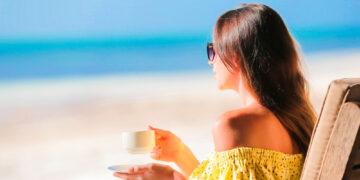 Drinking hot drinks to cool down